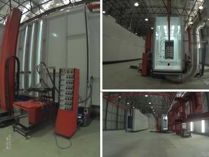 Powder Coating guns on Automatic Profile tracking Reciprocators.